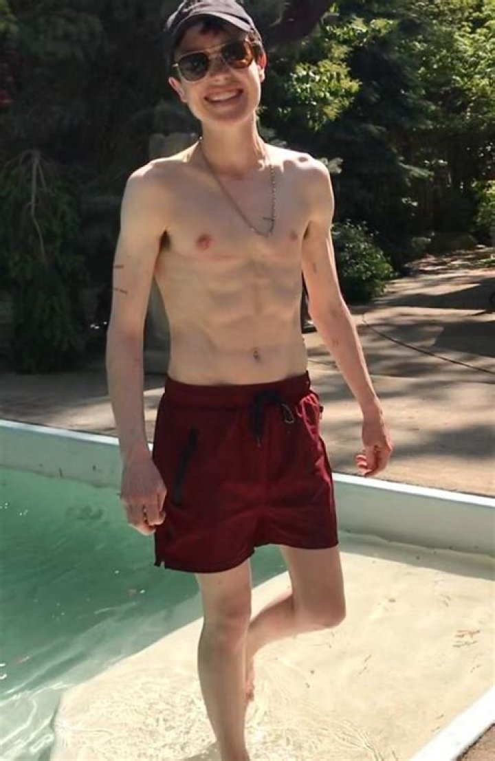 Elliot Page Shows Off Abs in Shirtless Pool Shot: ‘Trans Bb’s First Swim Trunks’