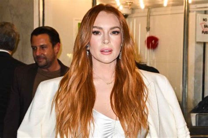 Lindsay Lohan Debuts What Appears to Be a Totally New Face at Madrid Fashion Week
