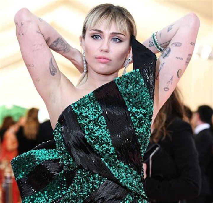 Miley Cyrus’ Many Tattoos Are Edgy, Trendy and Cool — Here’s a Definitive Guide to All Her Ink